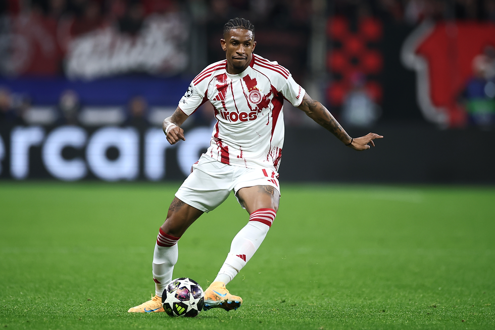 Andre Luiz of Olympiacos FC controls the ball during the UEFA Champions League 2025/26 League Knockout Play-off Second Leg match between Bayer 04 Leverkusen and Olympiacos FC at BayArena on February 24, 2026 in Leverkusen, Germany. (Photo by Alex Grimm/Getty Images)