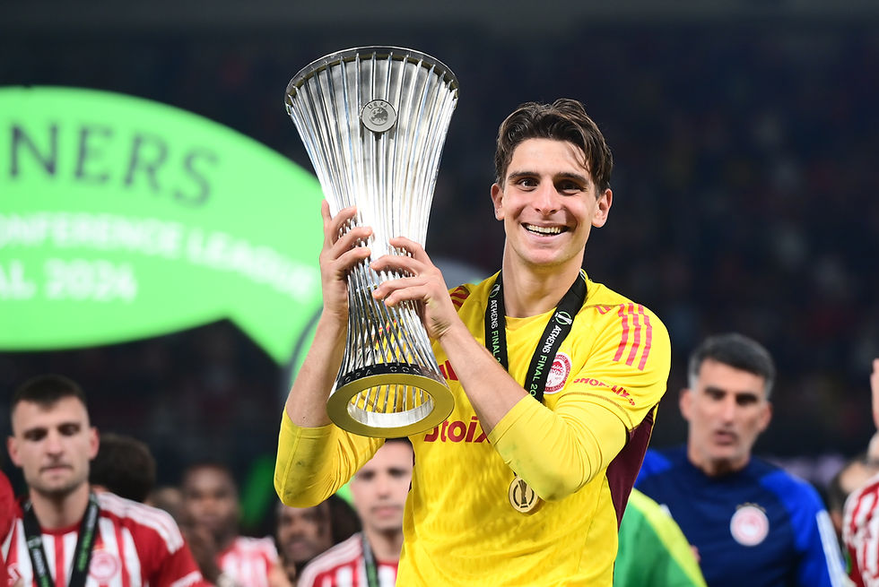 2024 Kostas Tzolakis holding trophy in UEFA Conference League Trophy Presentation - Giorgos Matthaios/EUROKINISSI