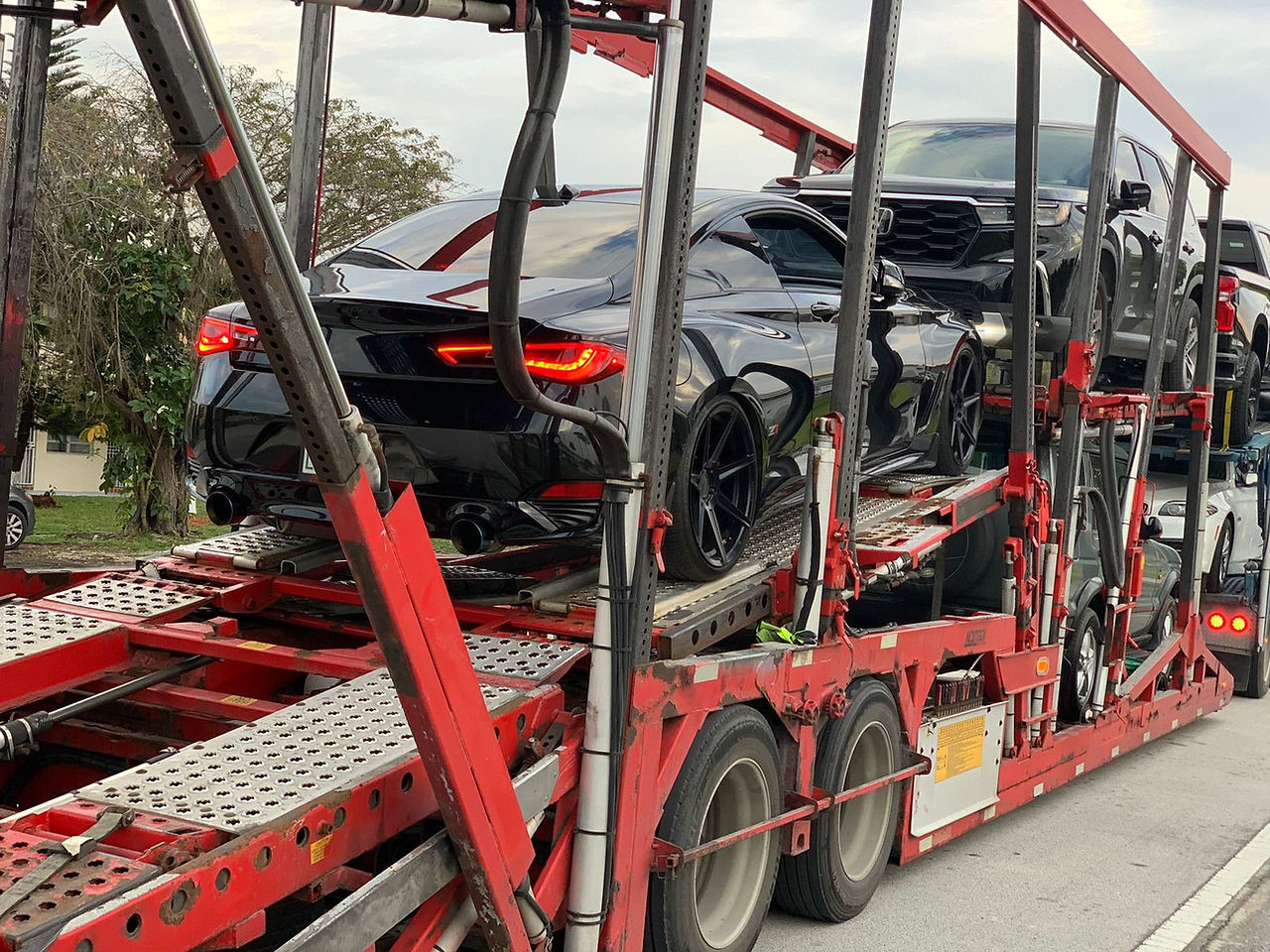 Transporte de carros en madrina