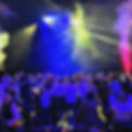 Gala d'entreprise 500 personnes à Montpellier avec DJ sur scène, fumée colorée et éclairage spectaculaire