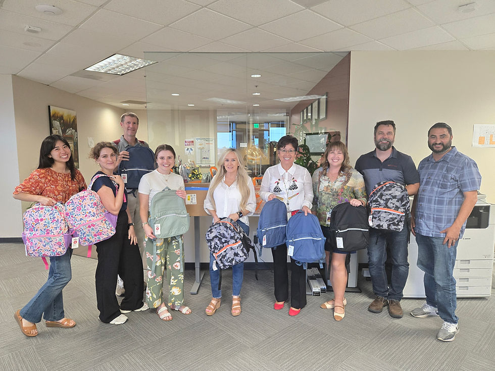 Zephyr Rail Team dropping off their school supplies donations at the AECOM Office's School Supplies Drive Box