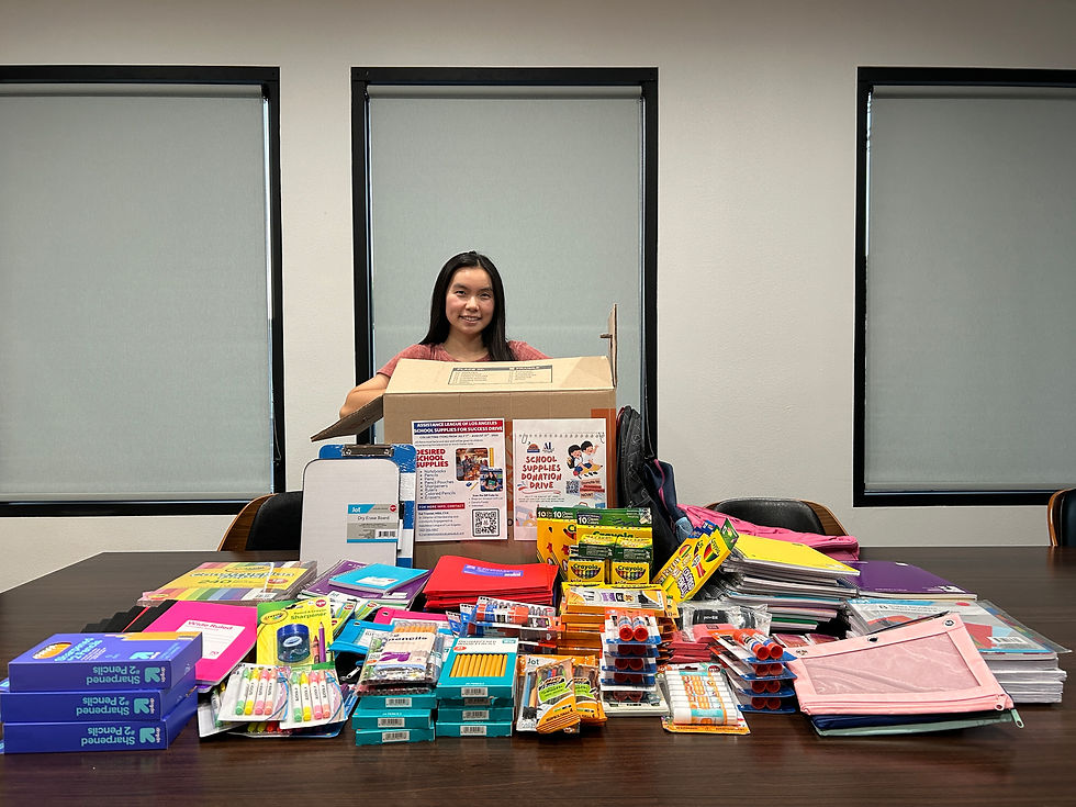 ASCE OC Community Service Chair, Calista Wong, with some of the School Supplies Drive donations