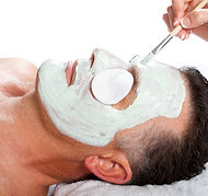 middle age man with facial mask in beauty salon.jpg