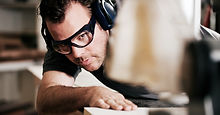 Carpenter Sawing