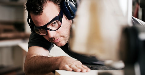Carpenter Sawing