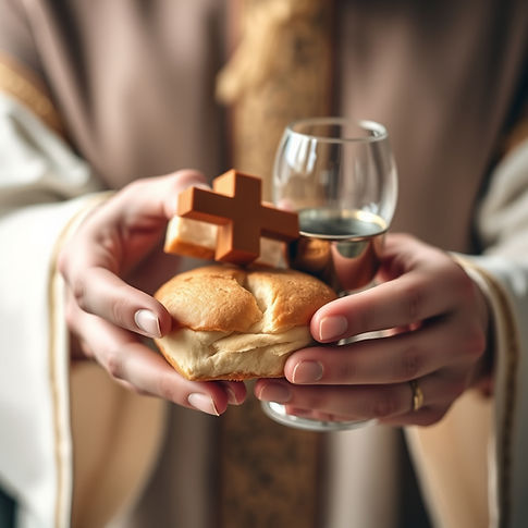 Zoomed-in hands holding communion bread & cup.jpg