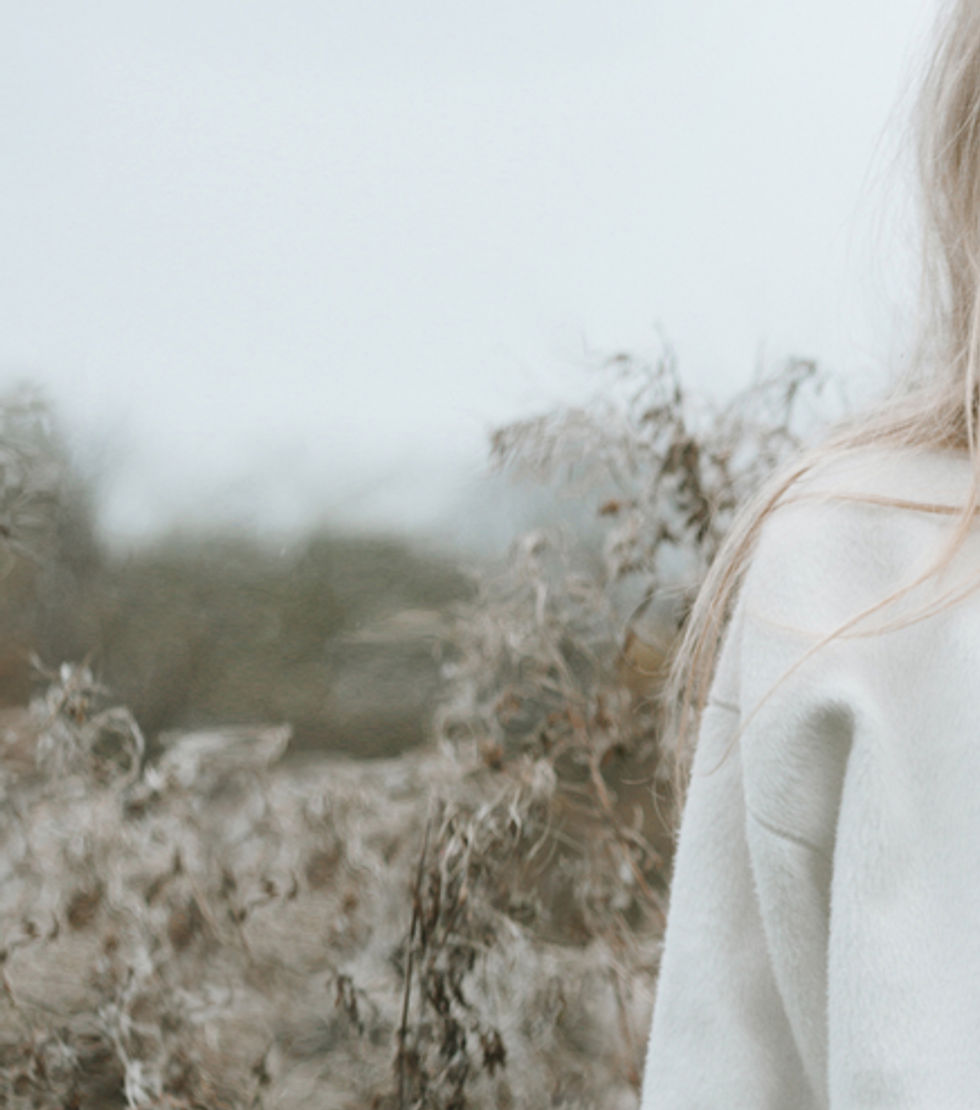 Blond Girl in a Field