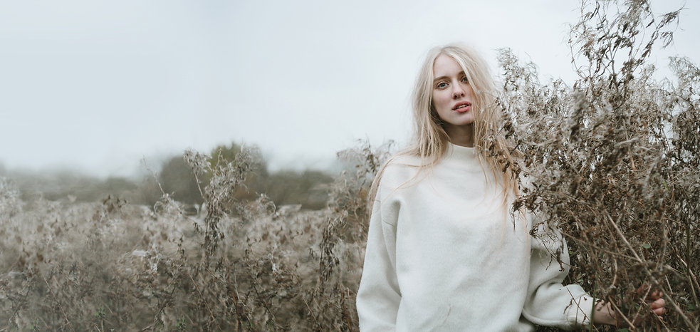 Blond Girl in a Field