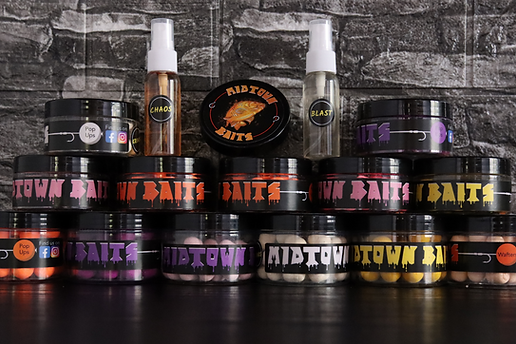Against a tiled background is a stack of pots of airball hook baits