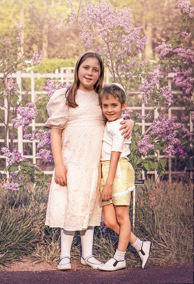 Two siblings holding each other during Children Photography Session with Chumie Paneth Photography