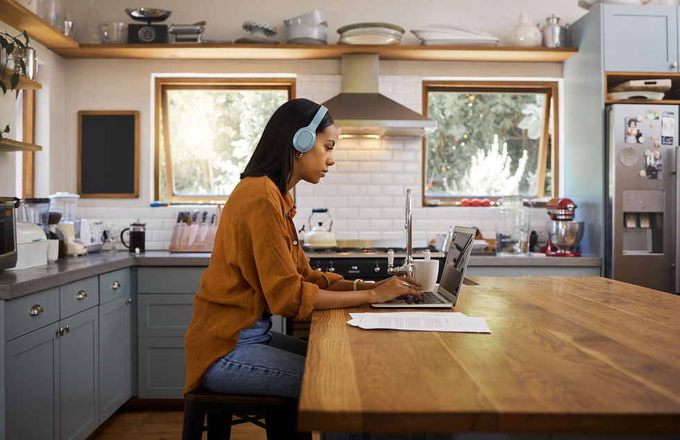 woman with headphones working from home
