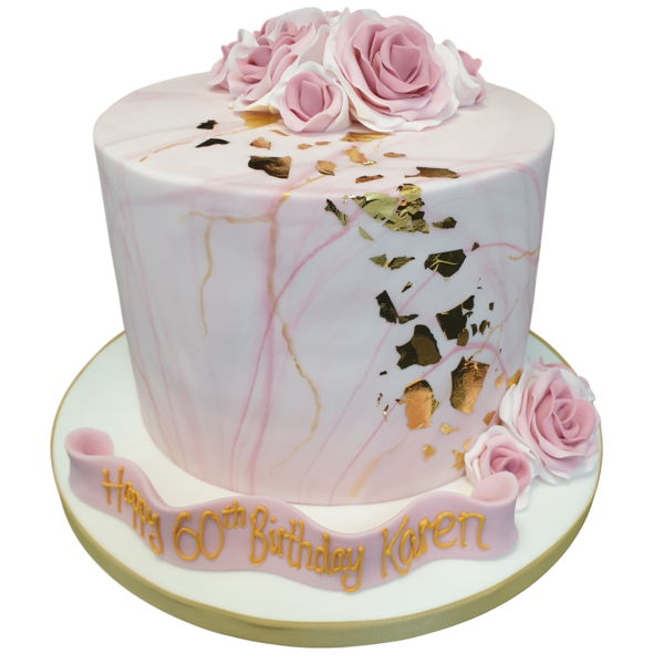 A stylish marble cake adorned with delicate roses and luxurious gold leaf decorations, perfect for special occasions and celebrations.