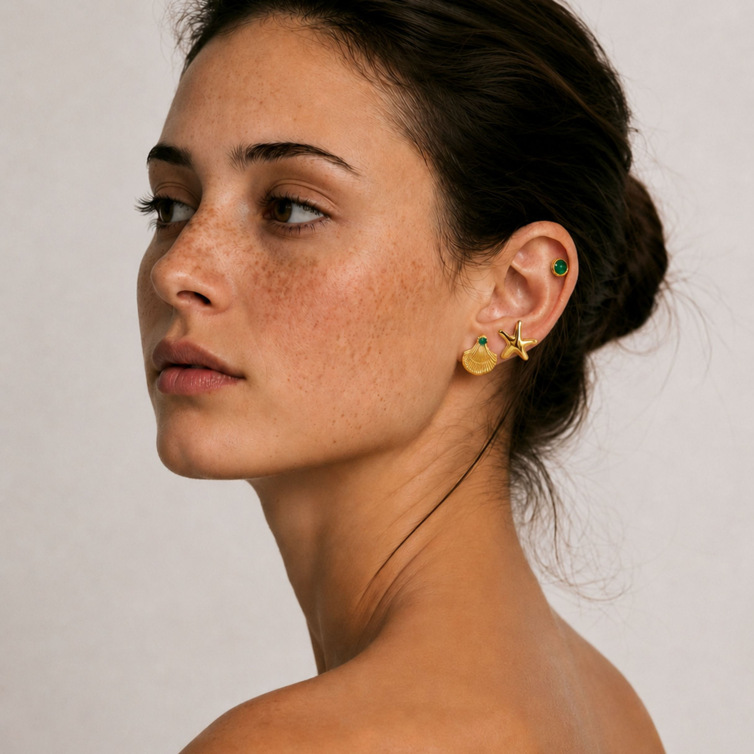 Model wearing Ocean Muse Shell & Starfish Stud Earrings