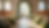 Eye-level view of wedding venue setup with floral arrangements and chairs