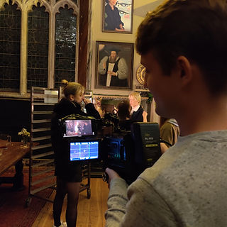 A director of photography eyes up the next shot.