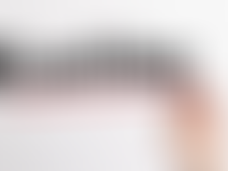 A hand with a marker underlining the word coaching.