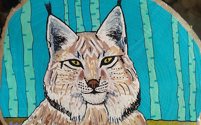 Peinture sur bois d'un lynx animal totem par Oréalys Révayia