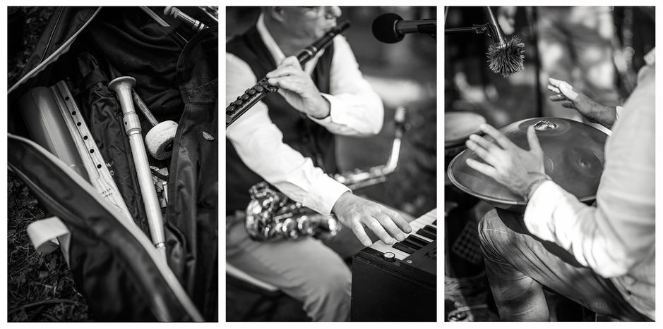 Musiker spielen Flöte, Keyboard und Hang