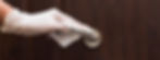 hand-with-glove-disinfecting-door-handle.png