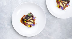 Gourmet plated dish representing luxury dining and premium lifestyle content by Danao Group