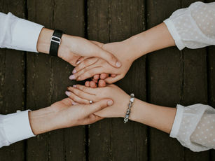 Pair of hands holding each other | NKMT