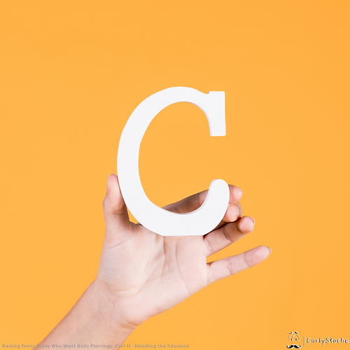 CurlyStache Raising Teens Blog | Person Holding the Letter C