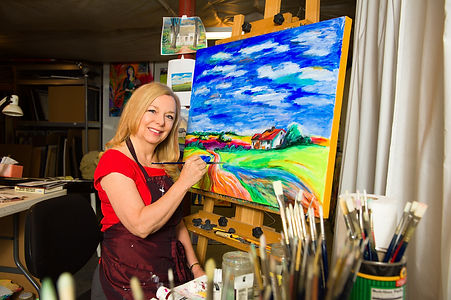 photo of Stacie Flint in her studio.jpeg