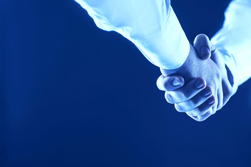 close-up-handshake-business-partners-black-background-photo-has-empty-space-your-text.jpg