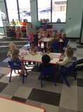 Toddlers participating in arts and crafts