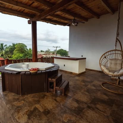 Vista amplia zona de jacuzzi.