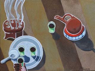 Sudanese coffee making with cups and incense burner on a striped East African rug