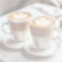 2 cappuccinos on a white table_edited.jpg