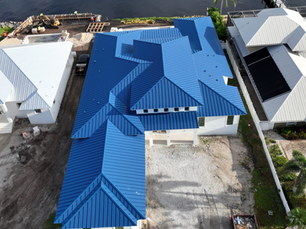 Stunning bright blue metal roof installed on this waterfront home in Crawfordville, Florida. Coastal Roofing Solutions makes premium, storm-resistant roofing affordable for homeowners in Tallahassee and Crawfordville with flexible financing options and low monthly payments.