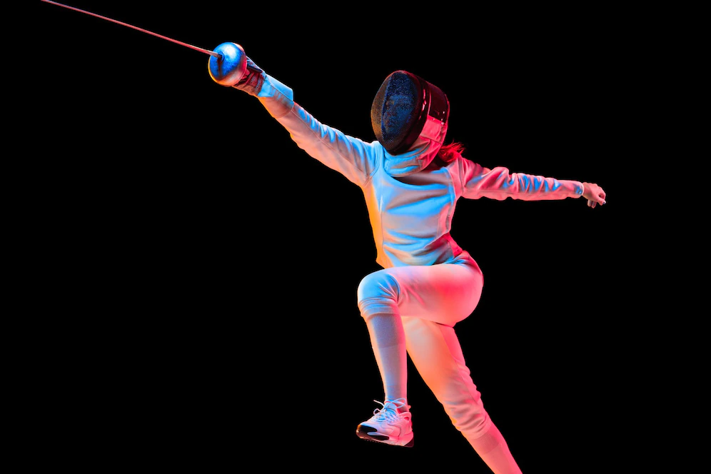 attacking-teen-girl-fencing-costume-with-sword-hand-isolated-black-background-neon-light-y