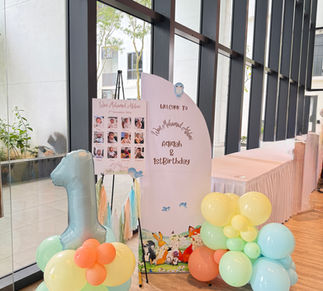 Birthday welcome sign with balloon arrangements