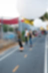 The LA River path in Frogtown with skateboarders, pedestrians and bike riders.