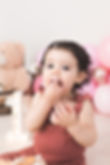 foto primo compleanno smashcake bambina di 12 mesi mangia torta perego silvia fotografa