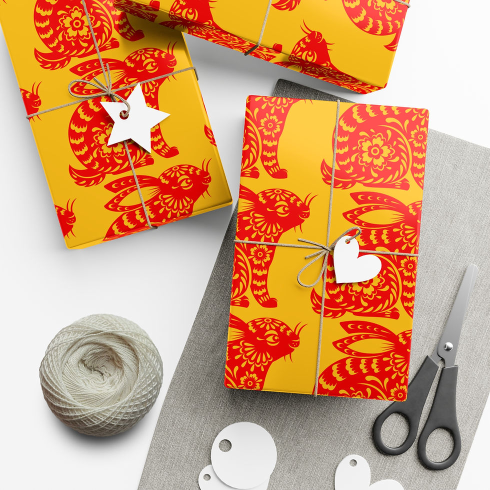 Thumbnail: Wrapped gifts on yellow paper with red details and white tags, scissors and twine