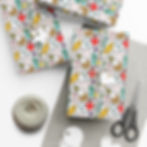 Thumbnail: Wrapped gifts with medical theme, scissors, and string on grey background.