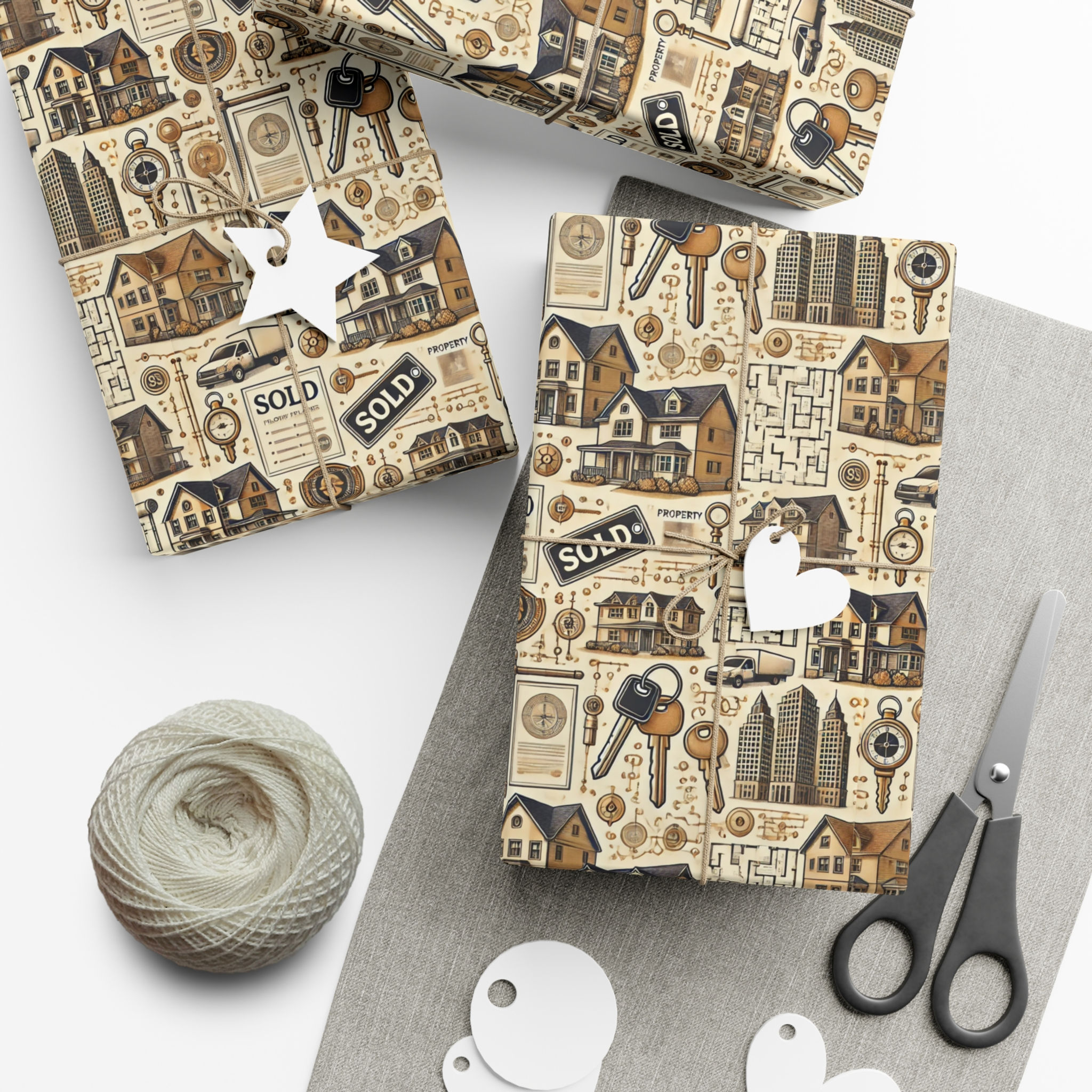 Wrapped gifts with keys and houses Sold tags and scissors for wrapping presents.