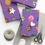 Thumbnail: Gift-wrapped presents with purple wrapping paper, scissors, and string on surface.