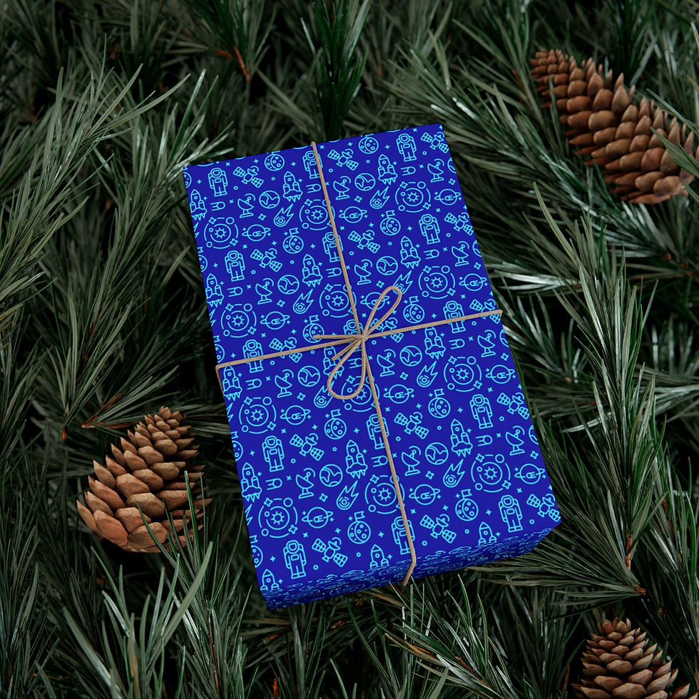 Thumbnail: Blue patterned gift wrap with twine bow on greenery, Queen Rock Band Inspired Gift.