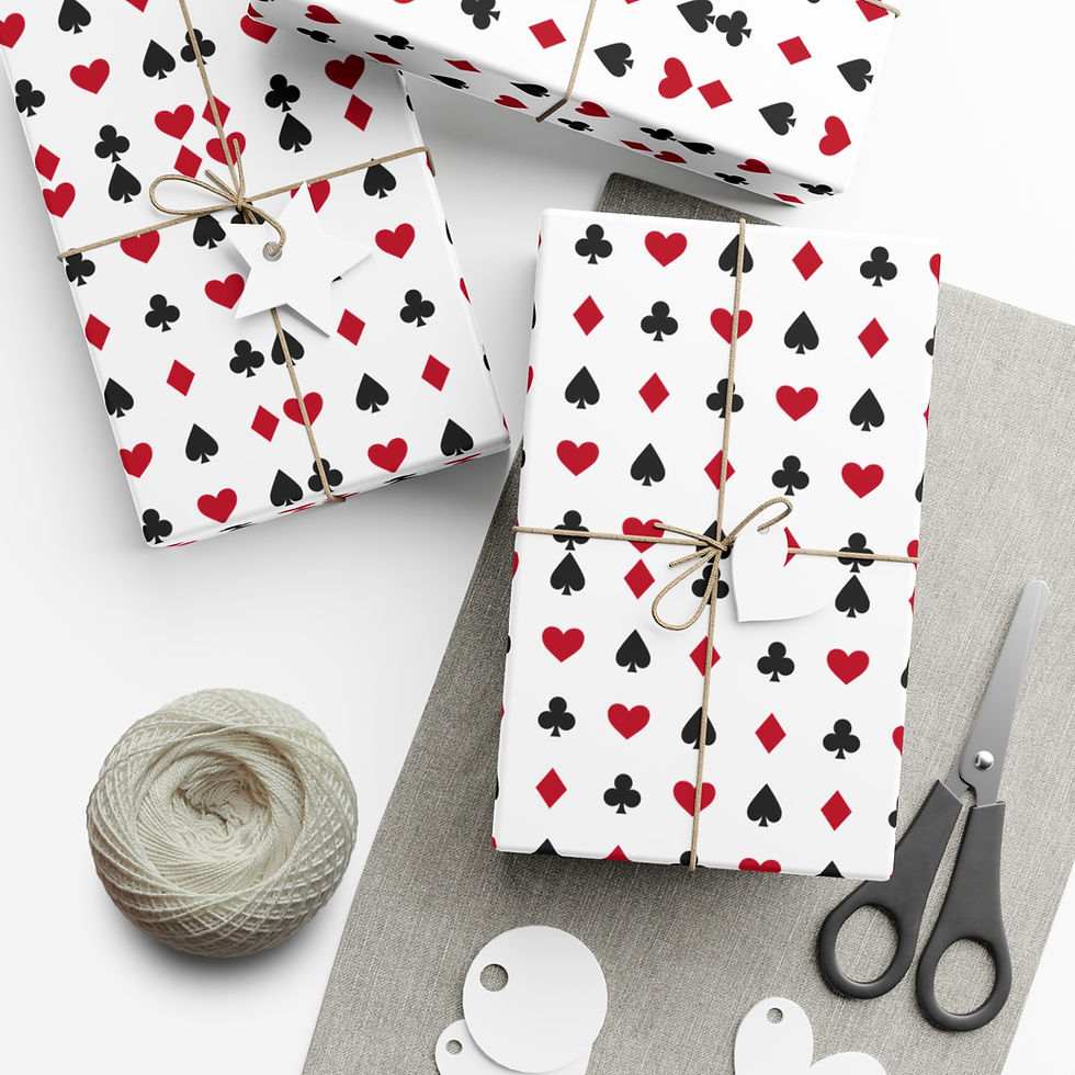Thumbnail: Wrapped gifts with card suit pattern, twine, scissors, and gift tags on table