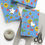Thumbnail: Beach Gift Wrapping Paper | Blue Wrap with Suns, Palm Trees, Crabs & Starfish