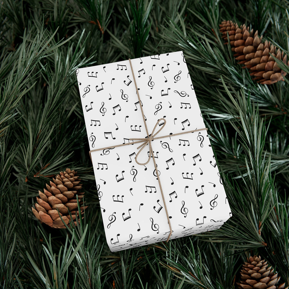 Thumbnail: Gift wrapped with musical notes, brown twine, and pine cones on green background.