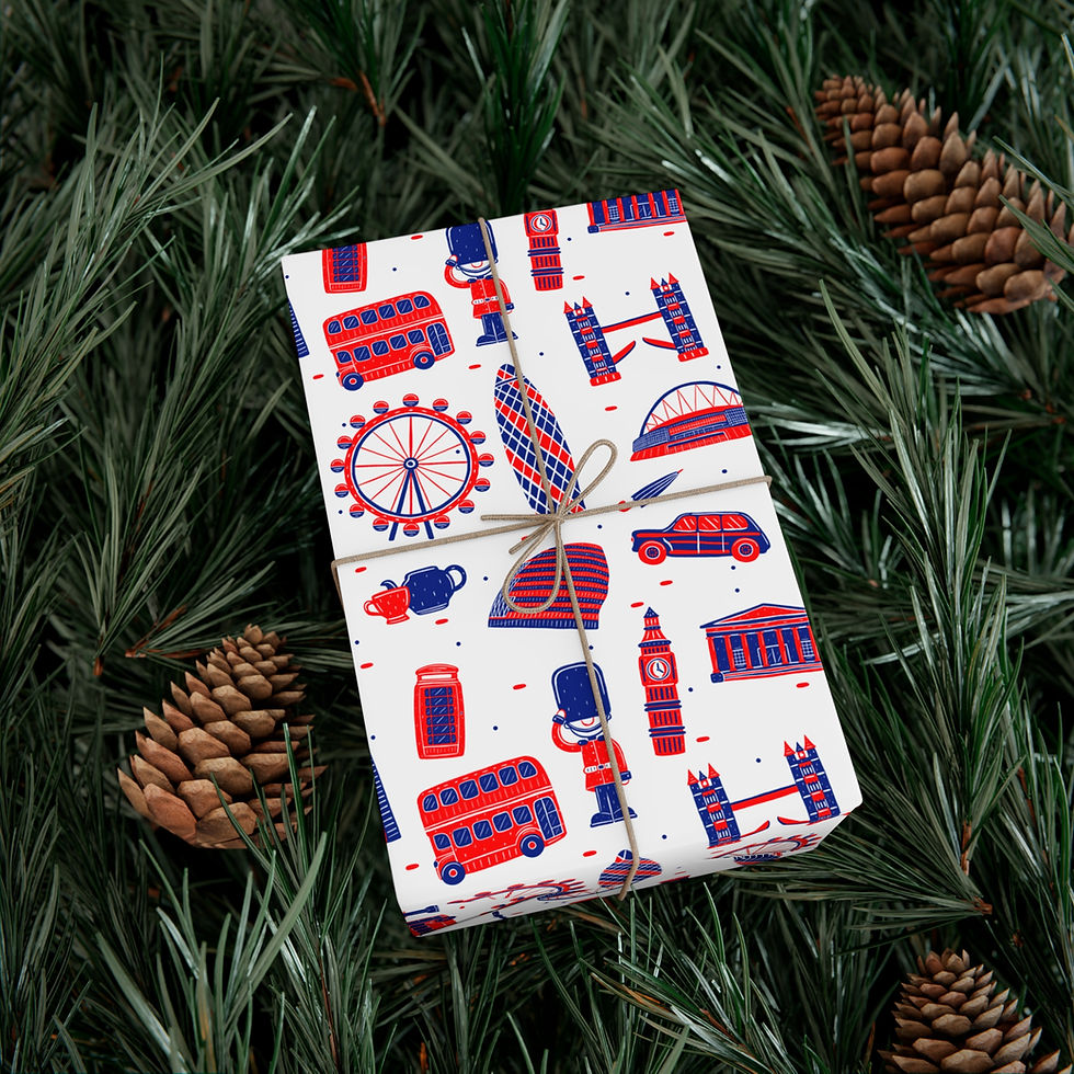 Thumbnail: Gift wrapped with London themed gift paper, surrounded by pine cones and greenery.
