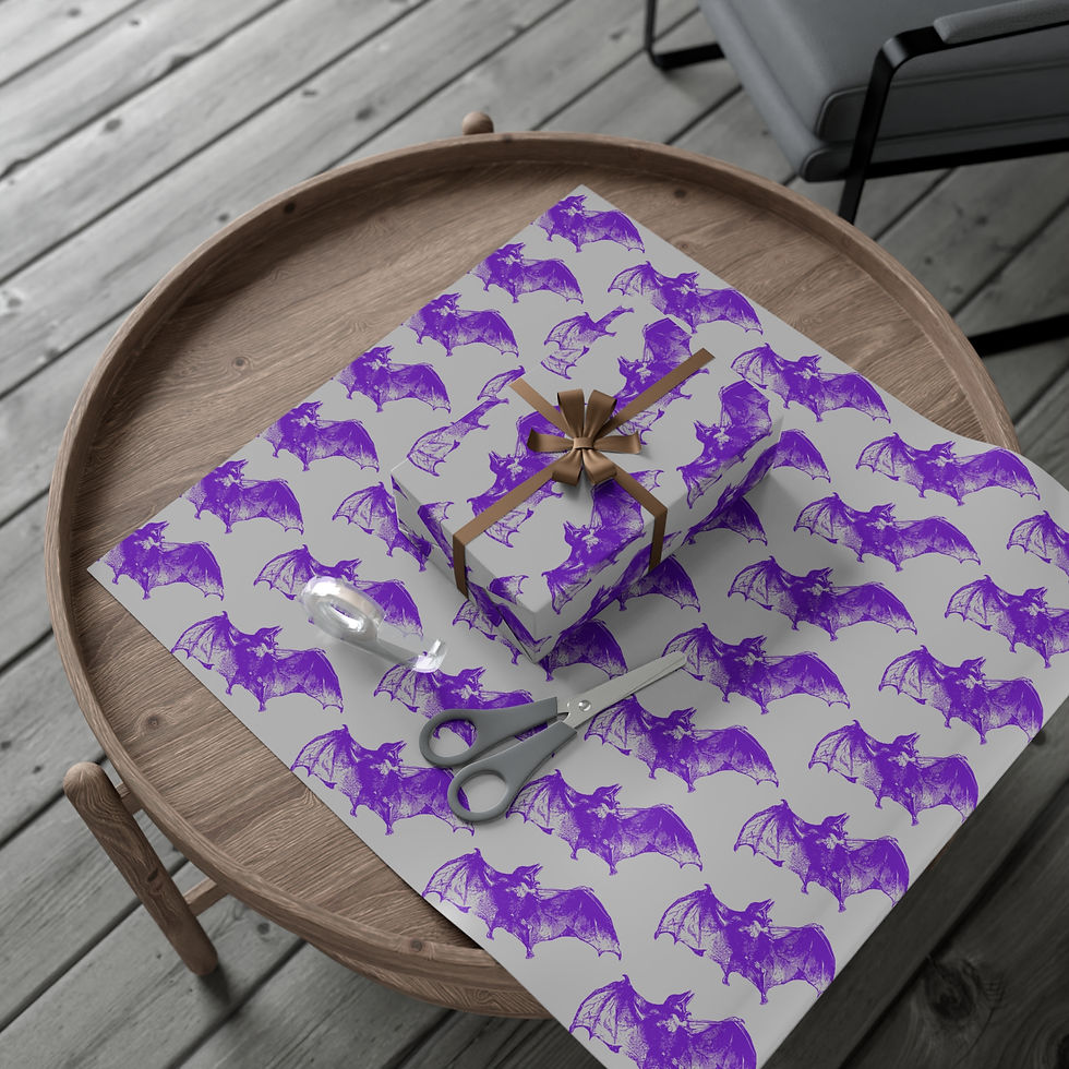 Thumbnail: Gift wrapped, bat pattern paper on table with scissors and brown ribbon.