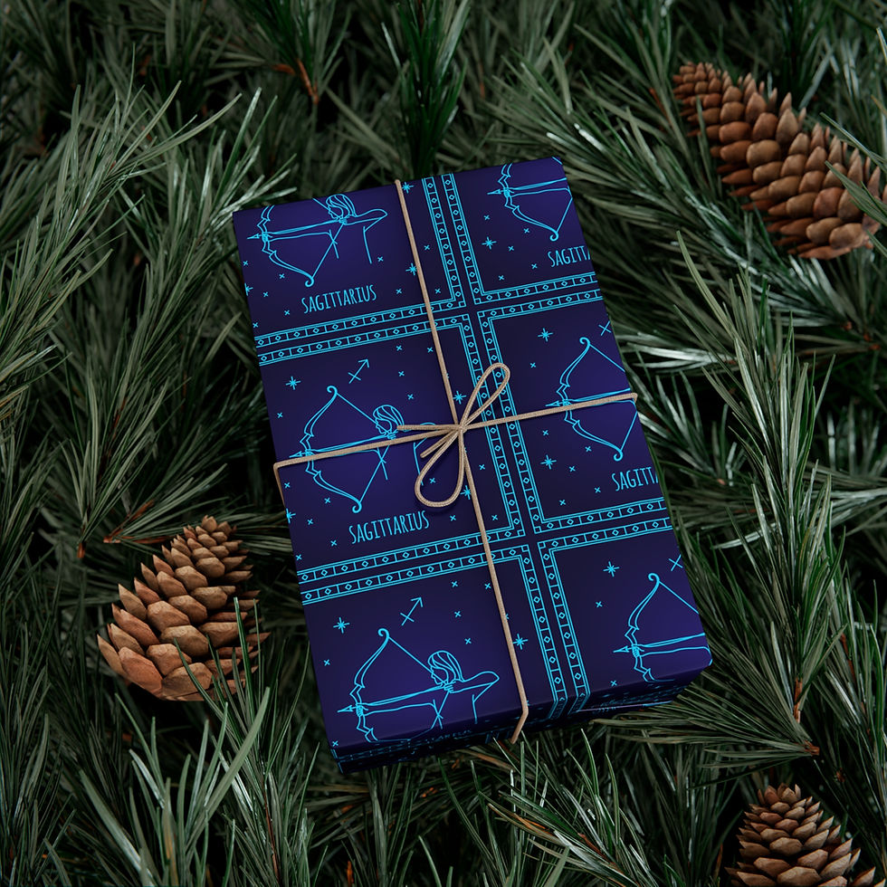 Thumbnail: Sagittarius gift wrap with teal bows and stars, wrapped with twine and pine needles.