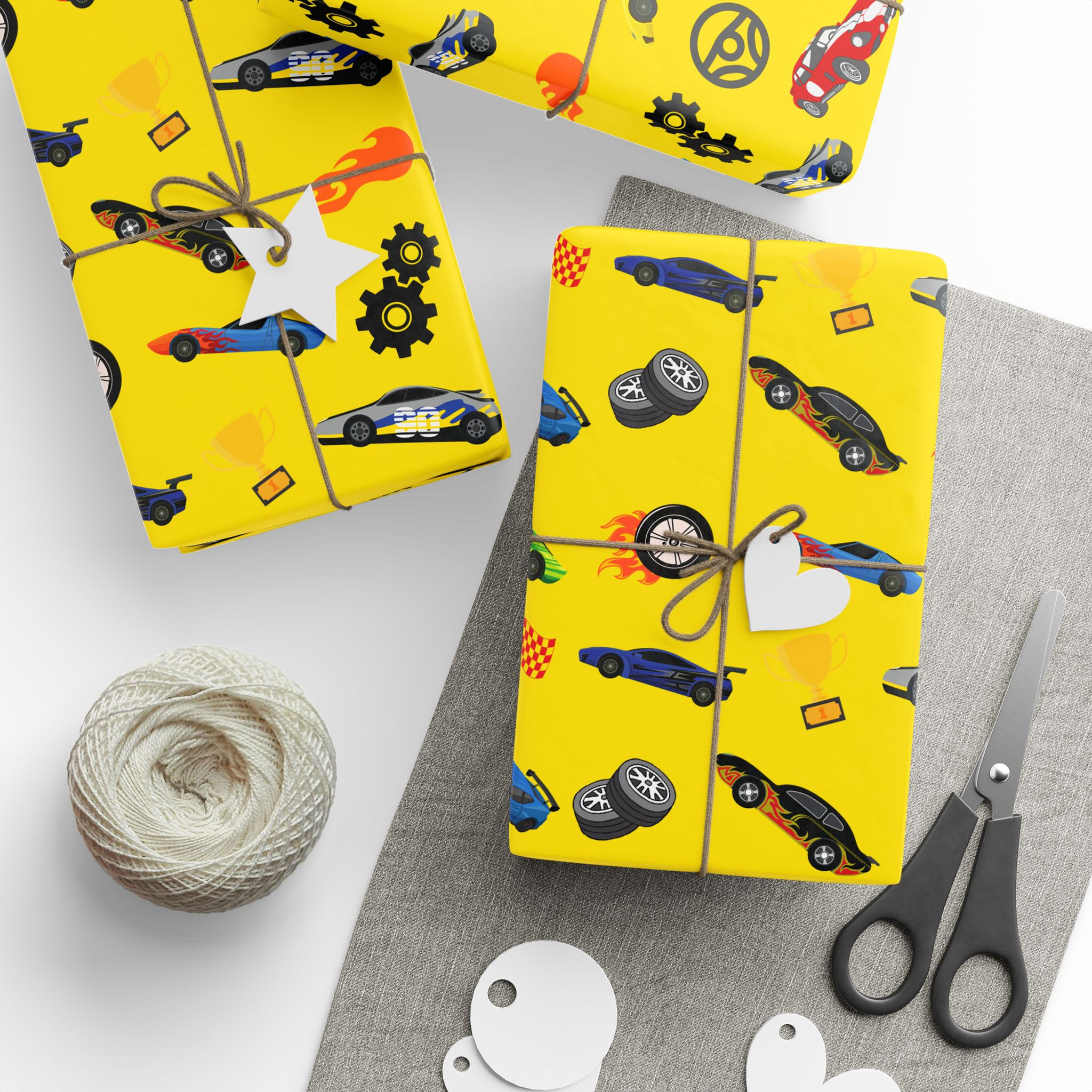 Yellow Hot Wheel gift wrap with race cars and gears.