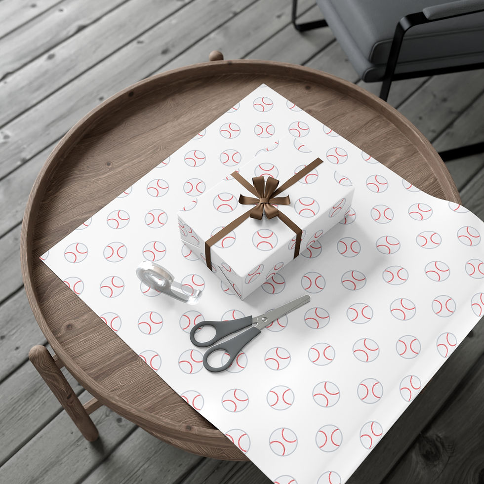 Thumbnail: Gift box wrapped in baseball pattern paper on a table with scissors.
